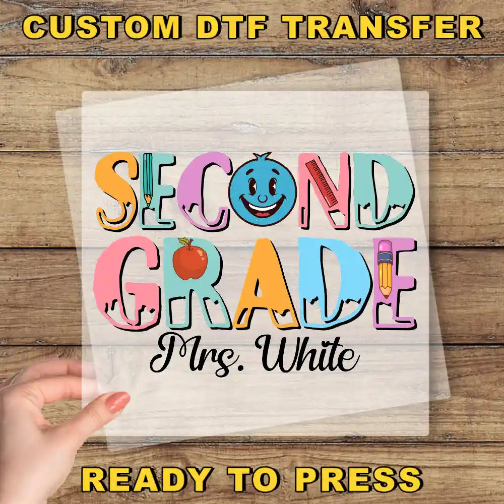 The image is a promotional poster for a custom DTF (Digital Transfer Factory) transfer service for a "Second Grade" teacher, Mrs. White. The poster features colorful text and illustrations related to the teacher and the school's second-grade program.
