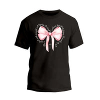 a black shirt with a pink bow on it