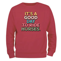 a red sweatshirt that says it's a good day to ride horses