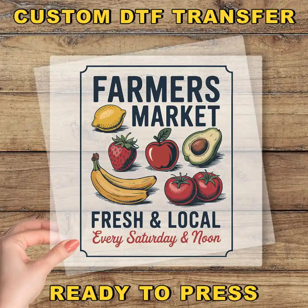 The image is a poster for a farmers market, featuring various fruits and vegetables such as bananas, apples, and avocados. The text on the poster reads "Farmers Market Fresh & Local Every Saturday & Noon" and "Ready to Press".