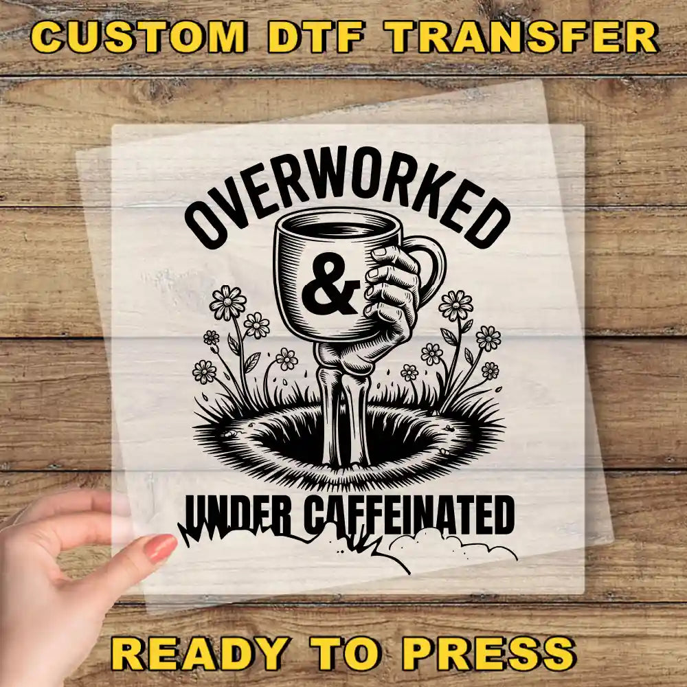 a person holding up a piece of paper with the words over worked and under caf