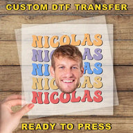 a person holding up a poster with a picture of a man