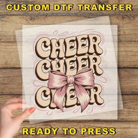 a person holding a piece of paper with the words cheer cheer on it