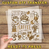 a hand holding a piece of paper with coffee related items on it