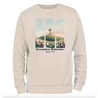 a white sweatshirt with a cross on it