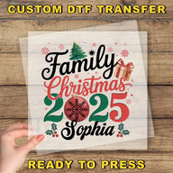 a hand holding a piece of paper with a christmas tree on it