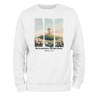 a white sweatshirt with a cross on it