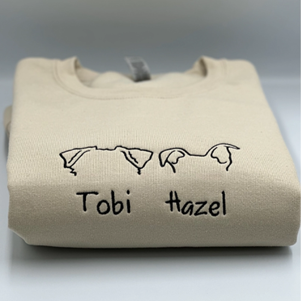 a t - shirt with a picture of two horses on it