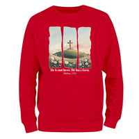 a red sweatshirt with a picture of a cross on it
