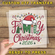The image is a hand holding a transparent sheet with a festive Christmas-themed design, including a Santa hat, Christmas lights, and a family tree.