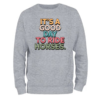 a grey sweatshirt that says it's a good day to ride horses