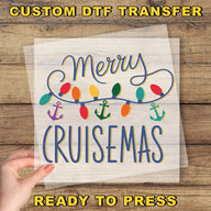 a hand holding a transparent sheet with a colorful Christmas-themed design, including a message and various Christmas lights.