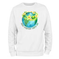 a white sweatshirt with the earth and flowers on it