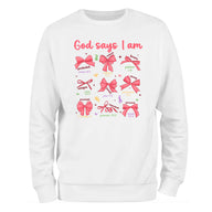 a white sweatshirt with red bows on it