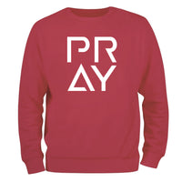 a red sweatshirt with the words pray printed on it
