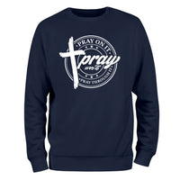 a navy sweatshirt with the words pray on it