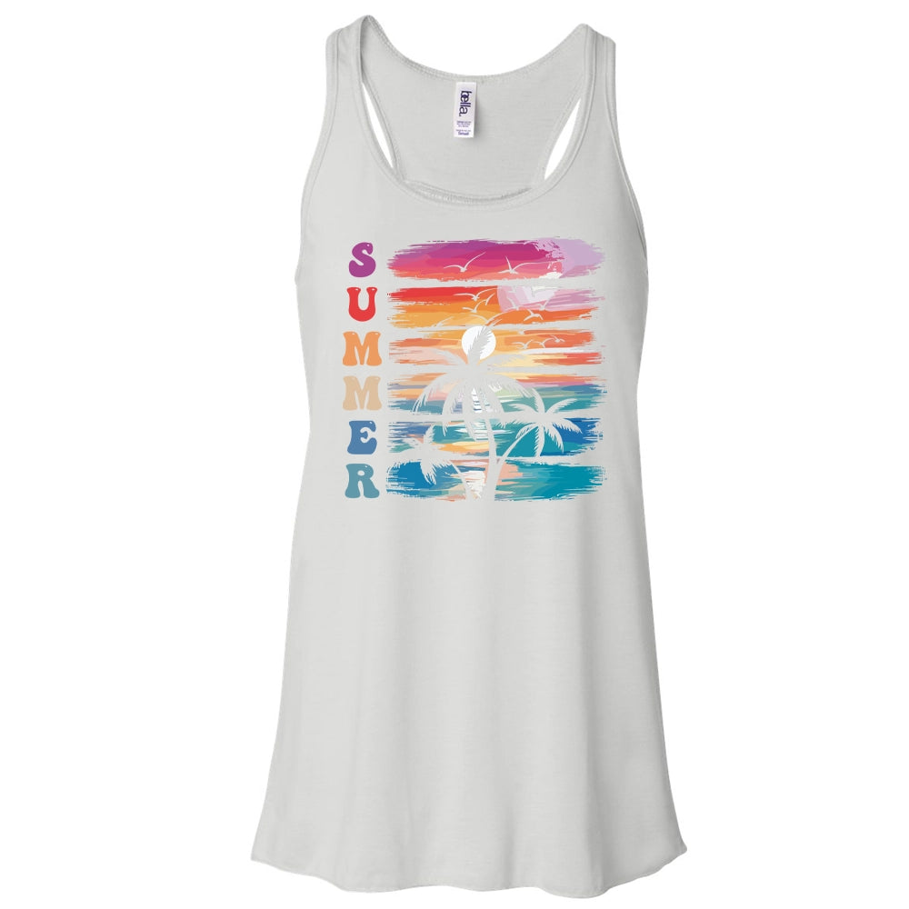 A white tank top with a graphic design featuring a sunset and palm trees.