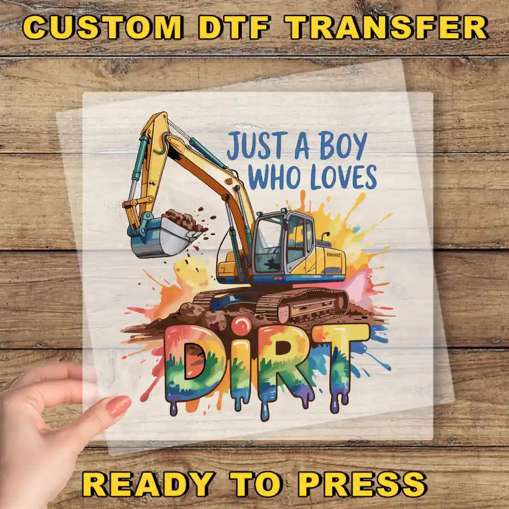 a hand holding a piece of paper that says, just a boy who loves dirt