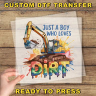 a hand holding a piece of paper that says, just a boy who loves dirt