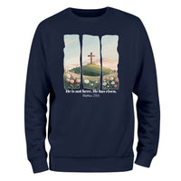 a blue sweatshirt with a picture of a cross on it