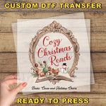 a hand holding a piece of paper with the words cozy christmas reads ready to press