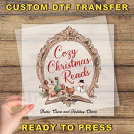 a hand holding a piece of paper with the words cozy christmas reads ready to press