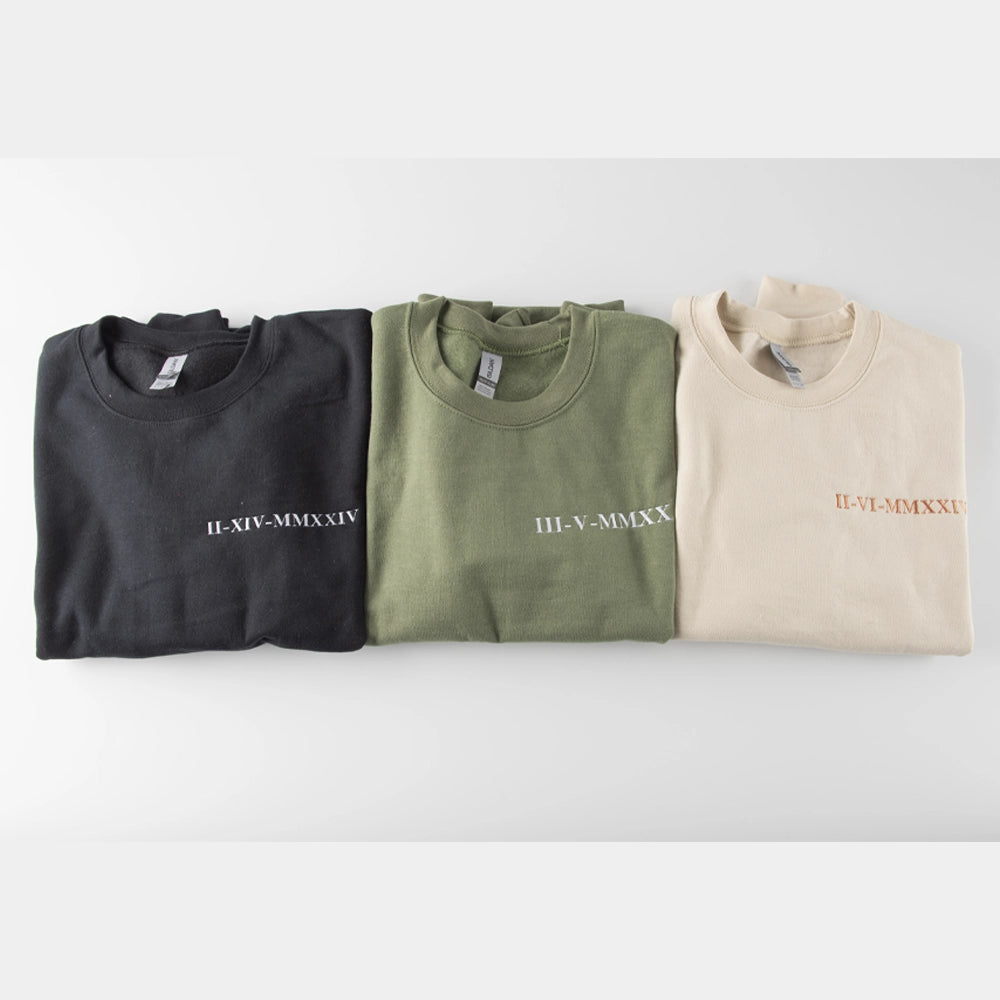 a row of four t - shirts sitting on top of each other