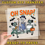 a hand holding a poster with a skeleton on it