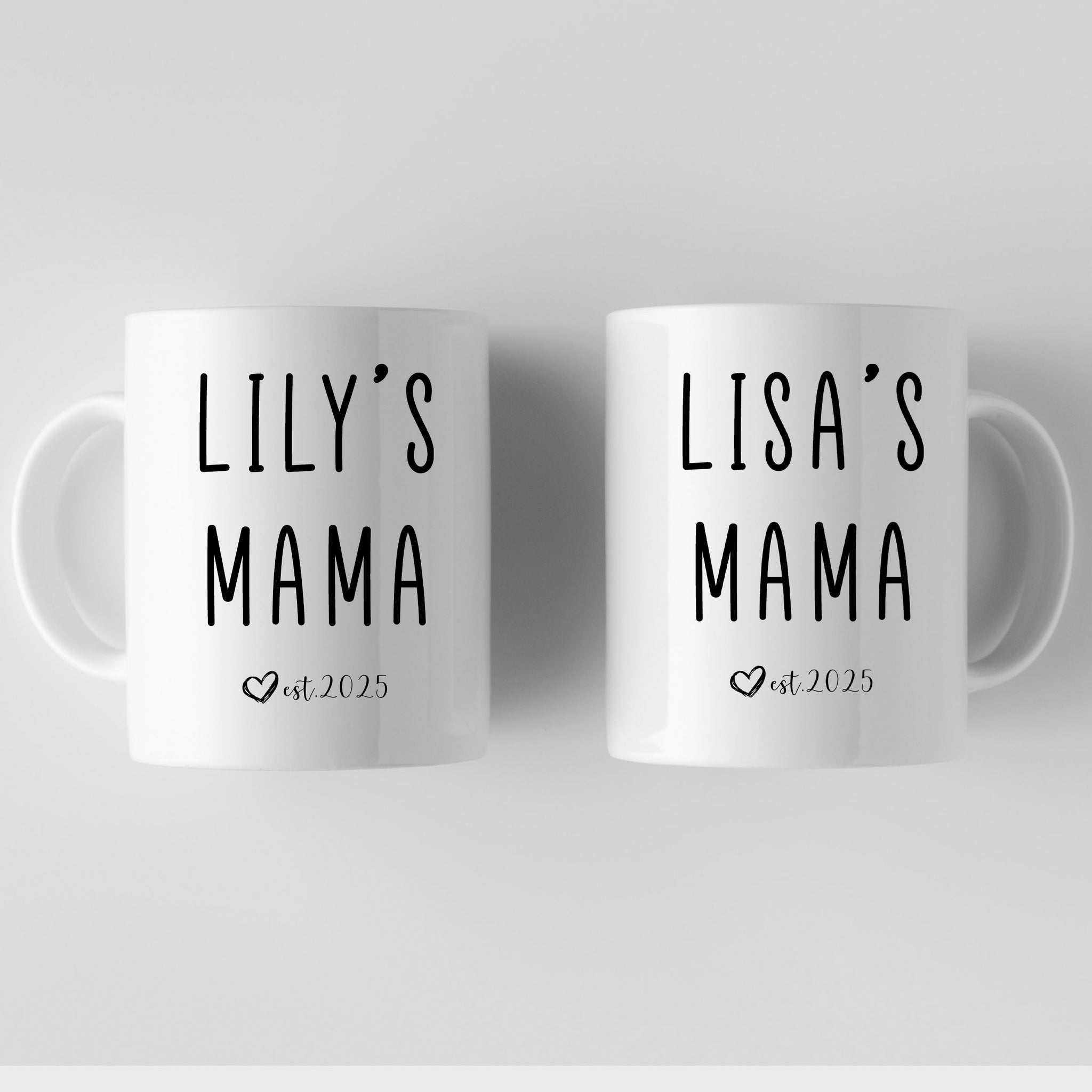 two white coffee mugs with the words lilly's mama printed on them