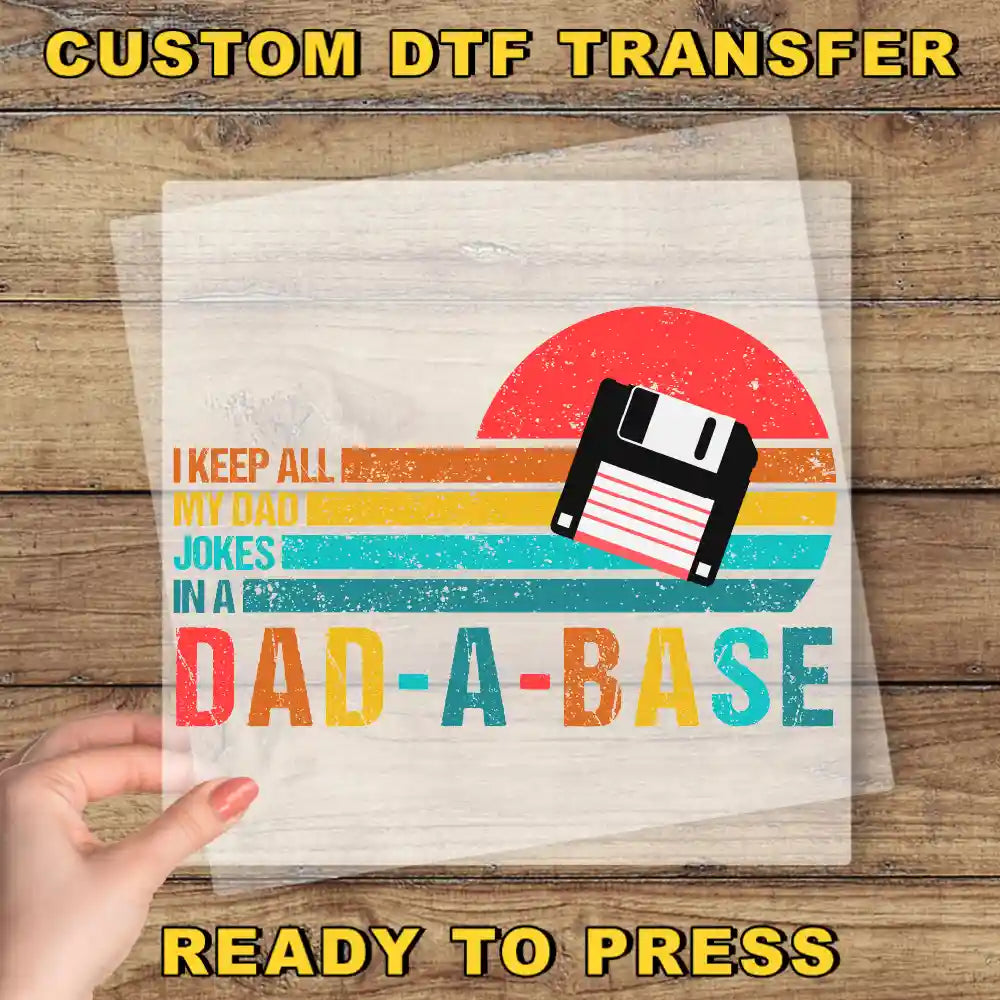 a person holding up a piece of paper with a picture of a cassette on it