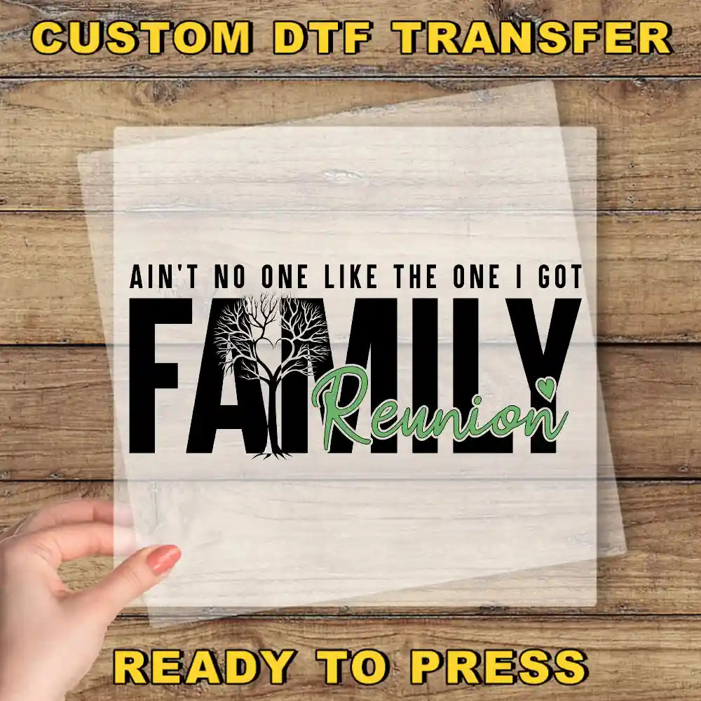 a person holding a piece of paper with the words family reunion on it