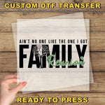 a person holding a piece of paper with the words family reunion on it