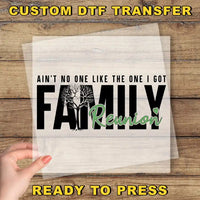 a person holding a piece of paper with the words family reunion on it