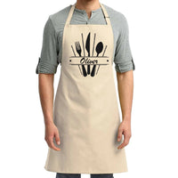 a man wearing an apron with a knife and fork on it