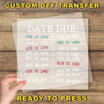 a hand holding a paper with a date due on it