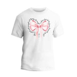 a white t - shirt with a pink bow in the shape of a heart