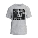 a grey t - shirt that says i keep all my dad jokes in a dad