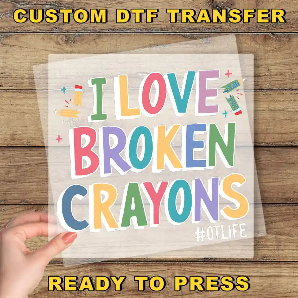 a person holding a piece of paper with the words i love broken crayos