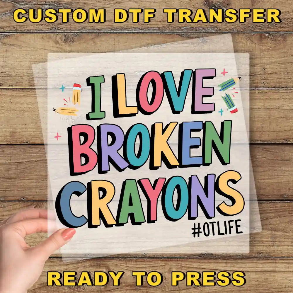 a person holding a piece of paper with the words i love broken crayos