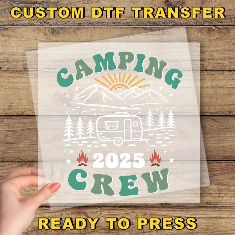 a person holding up a paper with a camper on it