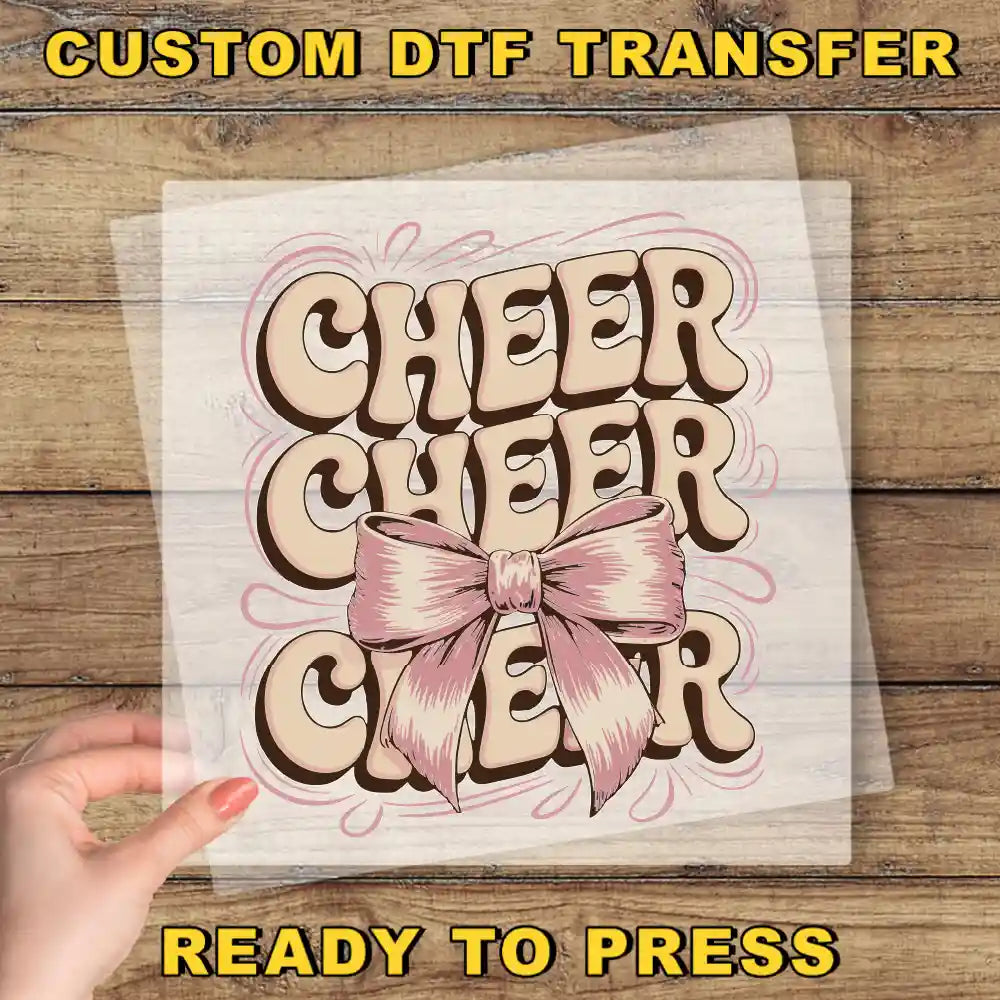 a person holding a piece of paper with the words cheer cheer on it