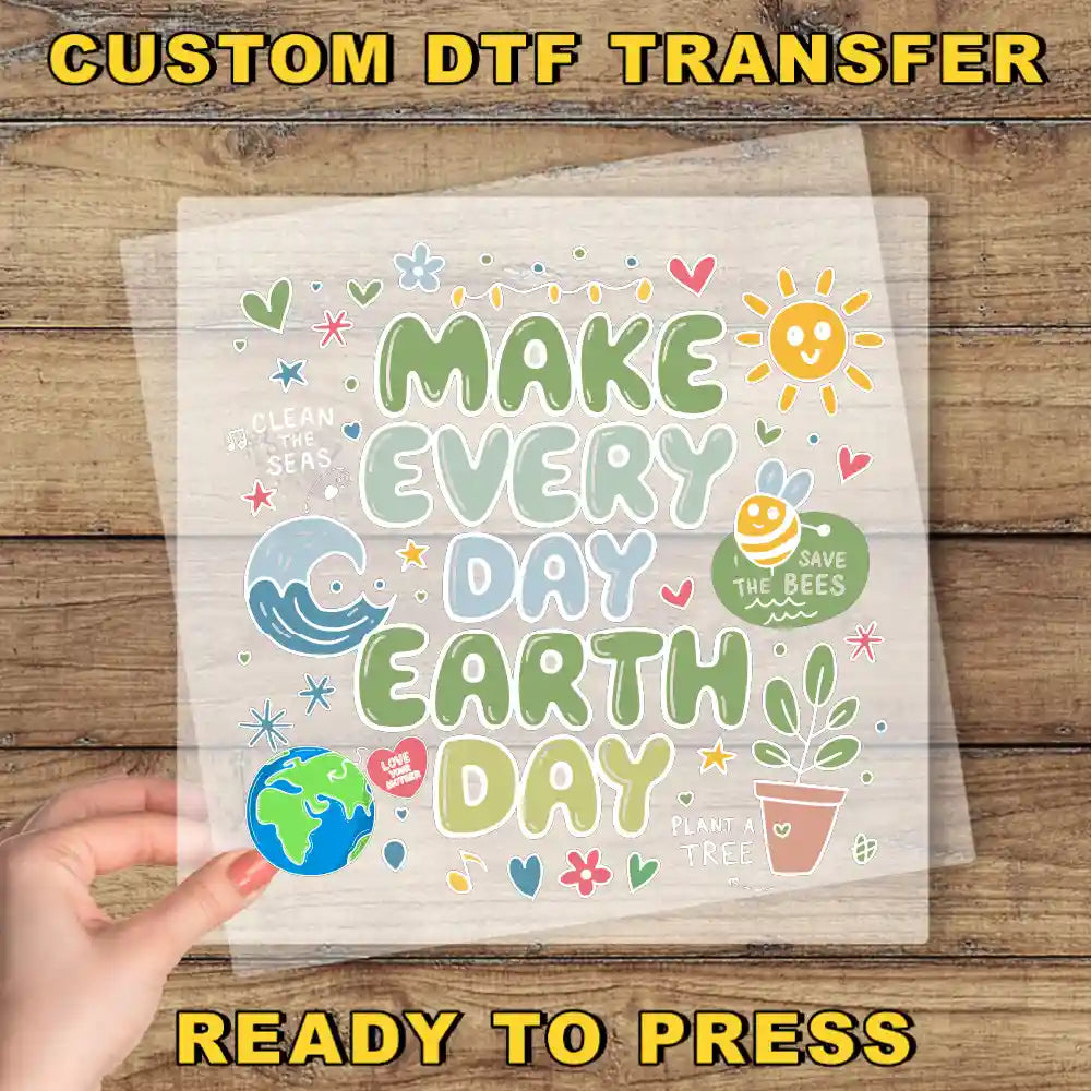 a person holding up a piece of paper with the words make every day earth day