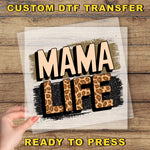 a hand holding a piece of paper that says mama life ready to press
