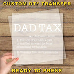 a person holding a piece of paper with the words dad tax on it