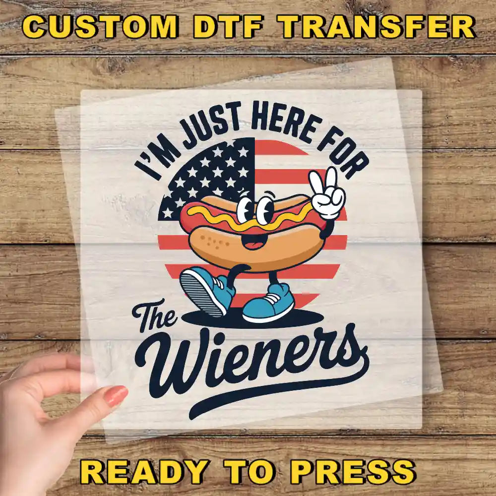 a person holding a piece of paper with a hot dog on it