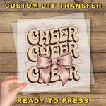 a person holding a piece of paper with the words cheer cheer on it