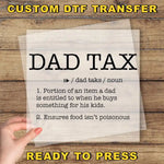 a person holding a piece of paper with the words dad tax on it