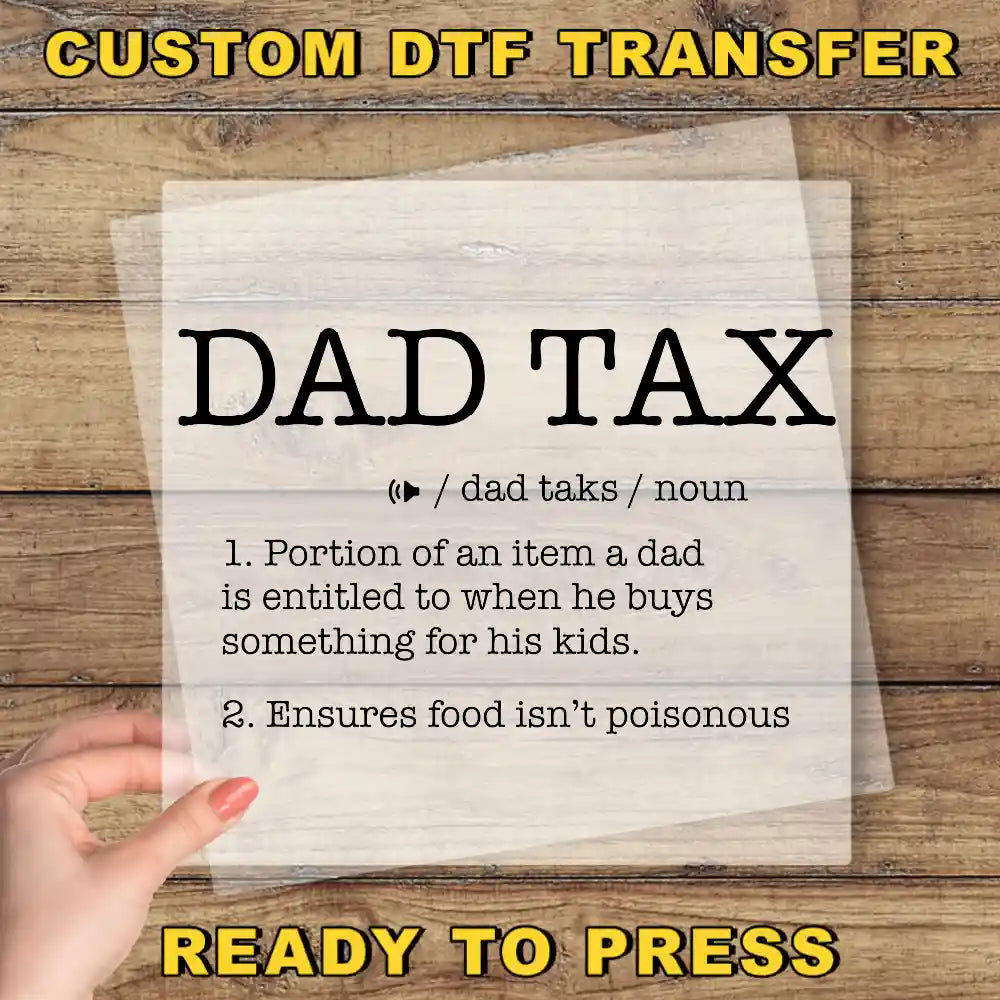 a person holding a piece of paper with the words dad tax on it