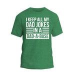 a green t - shirt that says i keep all my dad jokes in a dad