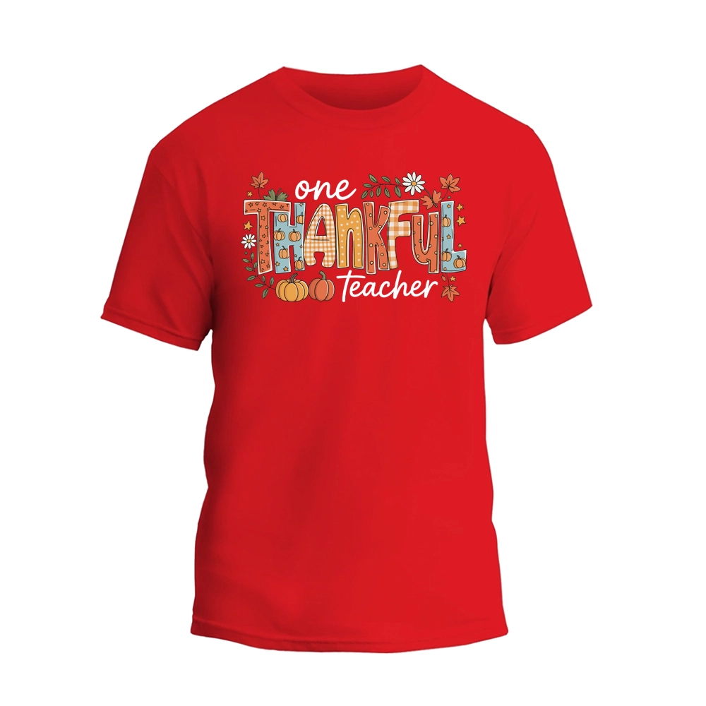 A red t-shirt with a colorful graphic design that says "One Thankful Teacher" in a stylized font.